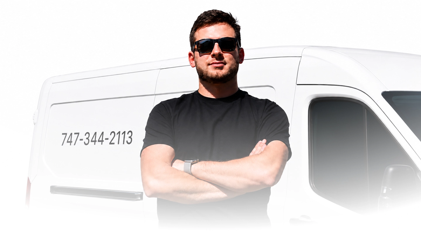 ProMates Electric electrician standing in front of a service van in Los Angeles